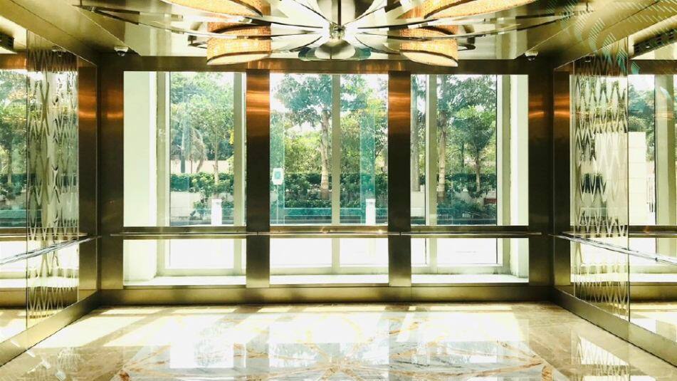 The record-sized elevator can transport up to 235 people at once and offers all-round scenic views.